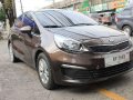 2016 Kia Rio AT GAS Brown Sedan For Sale -0