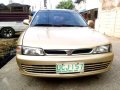 Mitsubishi Lancer GLXI 1995 AT Golden For Sale -0