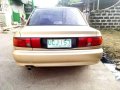 Mitsubishi Lancer GLXI 1995 AT Golden For Sale -4