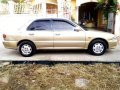 Mitsubishi Lancer GLXI 1995 AT Golden For Sale -3