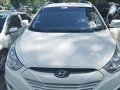 Hyundai Tucson 2011 AT White SUV For Sale -0
