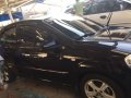 Chevrolet Aveo 2012 Lt. VGIS AT Black Sedan For Sale -1