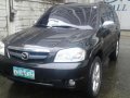 2006 Mazda Tribute V6 AT Gray SUV For Sale -0