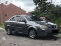 Chevrolet Optra 2004 Manual Gray Sedan For Sale-0
