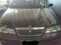 Nissan Exalta Efi 2000 AT Black Sedan For Sale -0