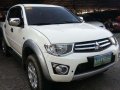 Mitsubishi Strada 4x4 2013 AT White For Sale -2
