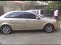 For sale Chevrolet Optra 1.6 2004 gold-6