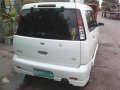 For sale white Nissan Cube 2000-3