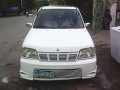 For sale white Nissan Cube 2000-1