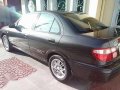 Nissan Exalta GS Grandeur 1.5 2002 AT Black For Sale -8