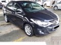 Mazda 2 sedan Black 2015 acq.-0