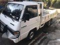 Mitsubishi L300 Dropside 1998 White For Sale -0