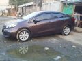 Kia Rio 2012 Matic Brown Sedan For Sale -0