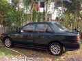 Mazda 323 1996 Manual Green Sedan For Sale -0