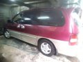 Kia Carnival 2000 Manual Red Van For Sale -0