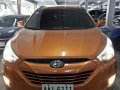 Hyundai Tucson 2014 Manual Gas Orange For Sale -10