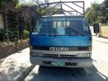 Isuzu ELF NPR Dropside Blue Truck For Sale -0