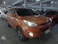 Hyundai Tucson 2014 Manual Gas Orange For Sale -0