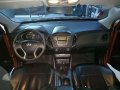 Hyundai Tucson 2014 Manual Gas Orange For Sale -4