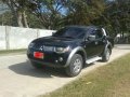 2009 Mitsubishi Strada 4x4 Black Pickup For Sale -1