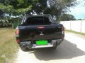 2009 Mitsubishi Strada 4x4 Black Pickup For Sale -0