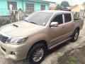 Toyota Hilux E 2014 Beige Truck For Sale -4