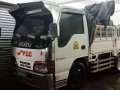 Isuzu Elf truck dropside for sale -0