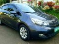 Kia Rio 2012 Gold MT Rush for sale-0