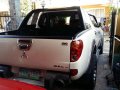 Mitsubishi Strada 4x4 matic top of the line2011 for sale-0