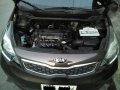 Kia Rio sedan 2014 model wendy brown color,-1