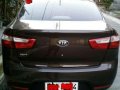 Kia Rio sedan 2014 model wendy brown color,-2