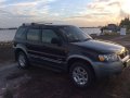 Ford Escape 4x2 XLT Black 2006 acquired low mileage 250k negotiable-0