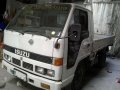 Isuzu Elf NKR Dropside 6W 12ft. Model 2000-8