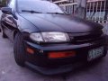 Mazda 323 Familia Black Sedan For Sale -0