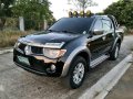 Mitsubishi Strada GLS 2008 4by4 Black For Sale -0