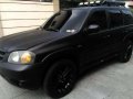 2005 Mazda SUV Matte Black for sale -0