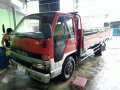 2002 Isuzu Elf Nkr 14Ft DrupSide 4HF1 Engine Dobol Tire-0