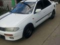 Mazda 323 Familia AT White Sedan For Sale -2