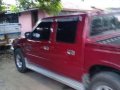 Isuzu Fuego Pickup 4WD Red For Sale -1