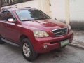 2006 Kia Sorento Diesel Red SUV For Sale -0