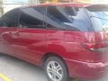 Automatic Transmission Red 2005 Toyota Previa with 150k km-2