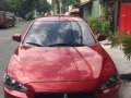 Red Mitsubishi Lancer EX - GLS 2010 - AT-0
