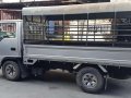 2007 Isuzu Nhr Dropside 10ft. With canopy-7