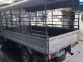 2007 Isuzu Nhr Dropside 10ft. With canopy-6