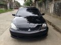 Mitsubishi Lancer CVT 2009 Black For Sale -7