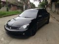 Mitsubishi Lancer CVT 2009 Black For Sale -0