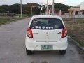 Suzuki Alto Deluxe 2014 acquired top of d line-5