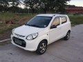 Suzuki Alto Deluxe 2014 acquired top of d line-1