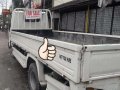 2002 Isuzu Elf Dropside White Truck For Sale -0
