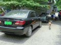 Toyota Corolla Altis Black 2004 Model For Sale -1